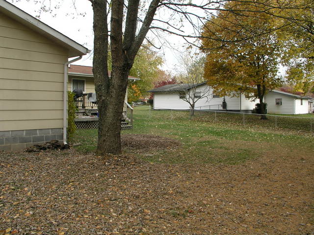 Visit #2 on March 8, 2001, reached the southeast corner of the backyard fence at 5809 Stoneleigh Road.