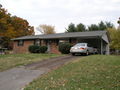 #5: Reached through a gate to the right of the carport, the backyard of 5816 Wilkerson Road is home to 36N 084W.