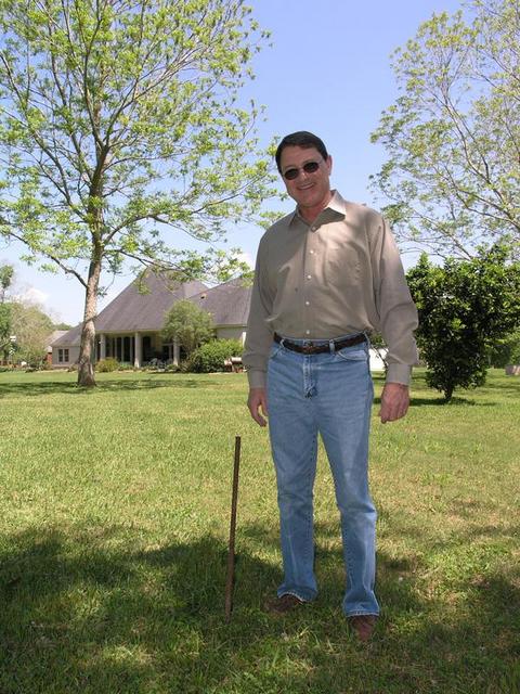 The owner of the confluence house, with marker