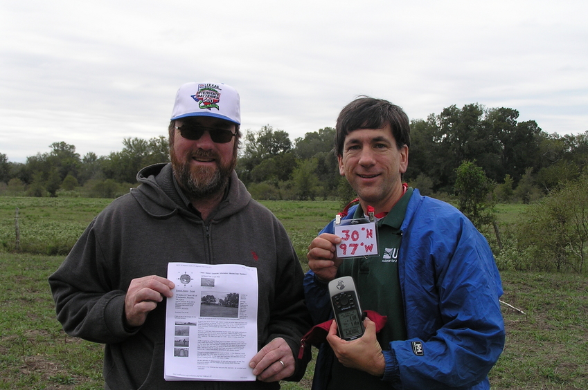 Brian Lehmkuhle and Joseph Kerski celebrate confluence centeredness at 30 North 97 West.