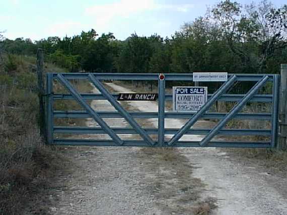 The confluence is about 1/4 mile past this gate to the west