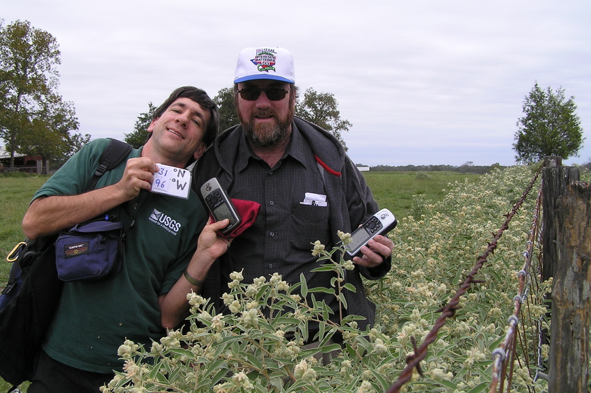 Joseph Kerski and Brian Lehmkuhle leaning over to capture 31 North 96 West.