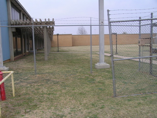 #1: Site of 33 North 97 West, looking east.  The confluence is 1 meter beyond the large cement pole in the background right center.