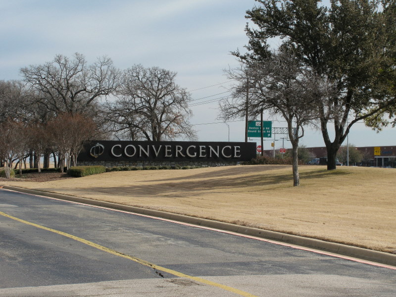 Looking back at one of the entrance signs from inside the business park