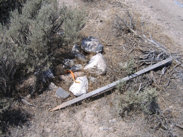 Cairn and fallen stick