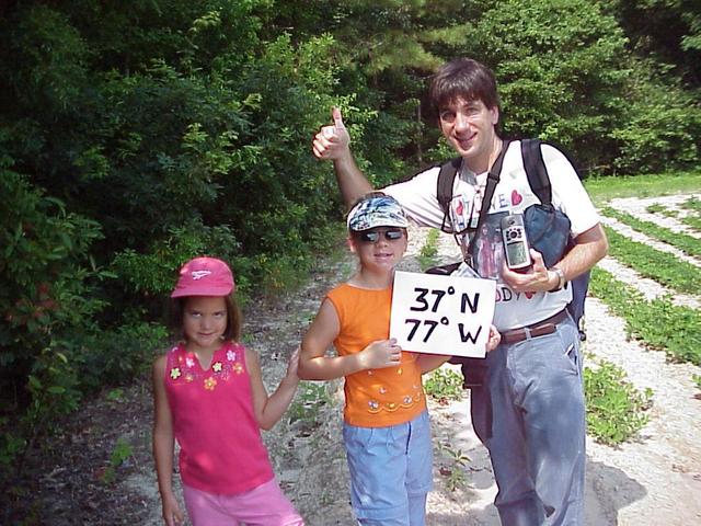 Lilia, Emily, and Joseph Kerski at the edge of the field; photograph by Janell Kerski.