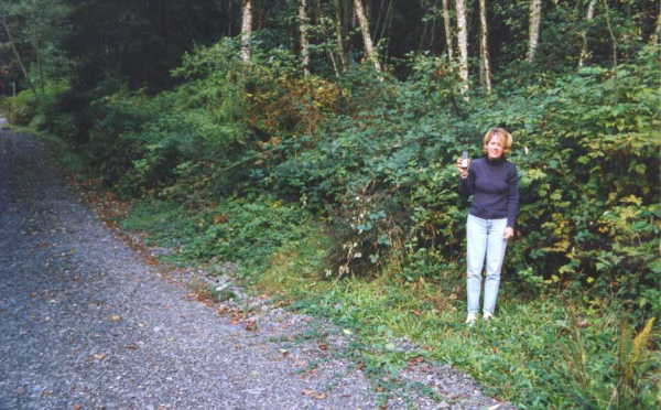 The confluence is in the thick blackberry bushes, behind Liz