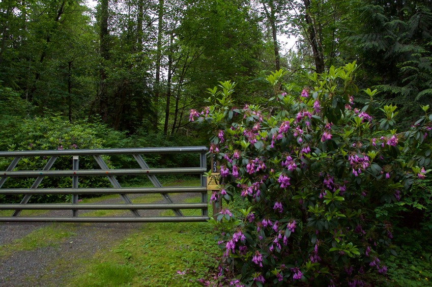 The confluence point lies about 200 feet away, inside this private residence. (This is also a view to the East.)