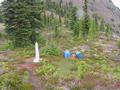 #7: Shot of border Obelisk with fuel drums and oil beside it