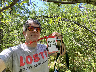 #7: Joseph Kerski with geography shirt at the confluence point. 