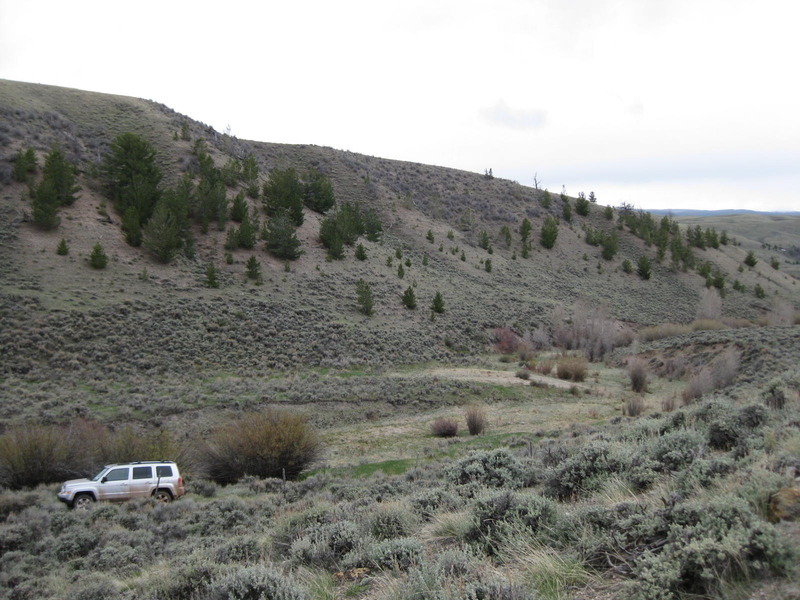 The Jeep parked along the border fence