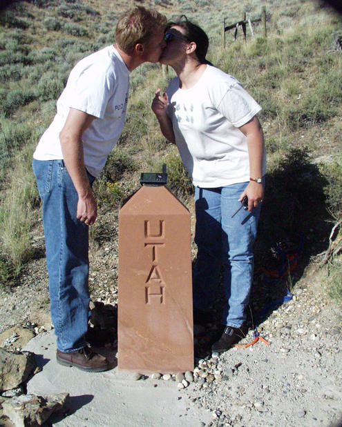 Aimee and Kent kissing in three states at the same time