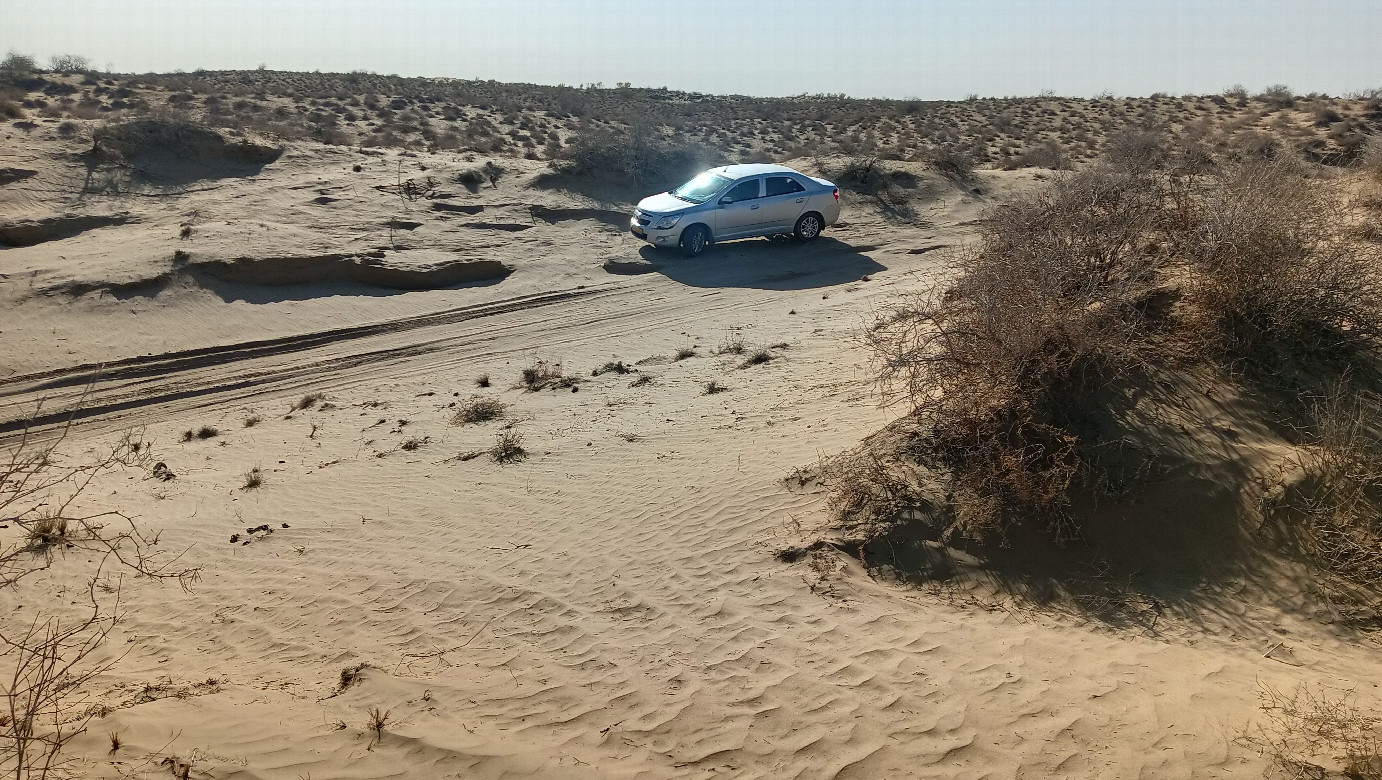 Parking on a sandy road