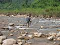 #7: Our alternative was to climb down the canyon and ford the river several times.  Me (Greg) crossing.