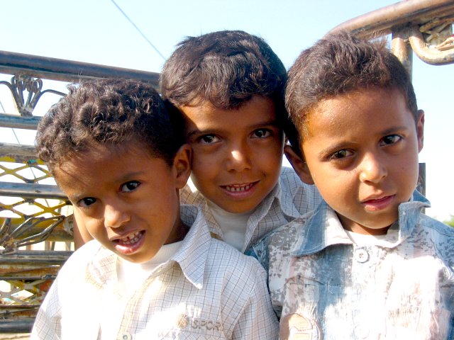 Local kids with us on a pick-up truck