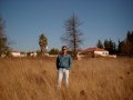 #3: Looking south. Housing development entrance visible. Willem Fourie enjoying some sun.