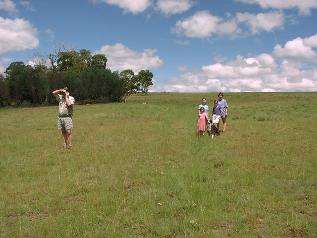 Family at Confluence with farmer