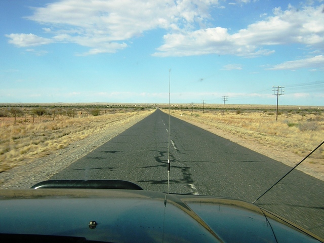 Just before the gate still on the tarred road