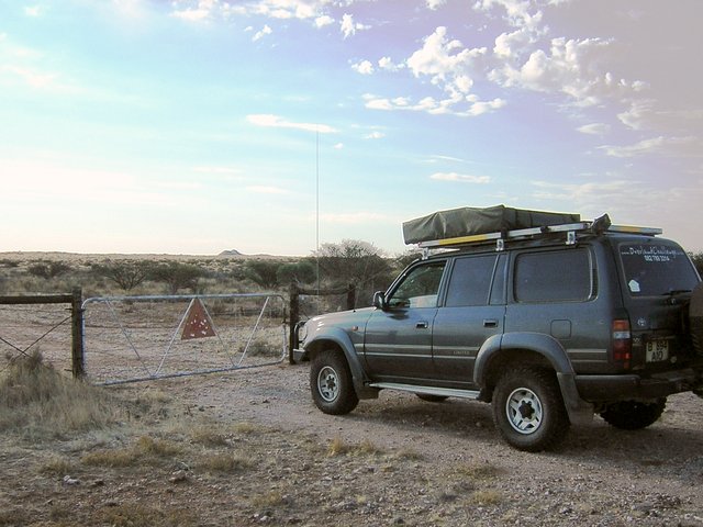 Car at the locked gate