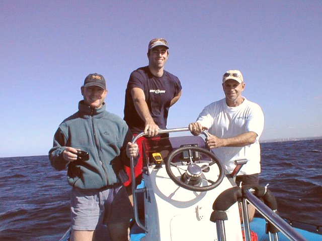 Roland, Bryan, Neville, and the boat.